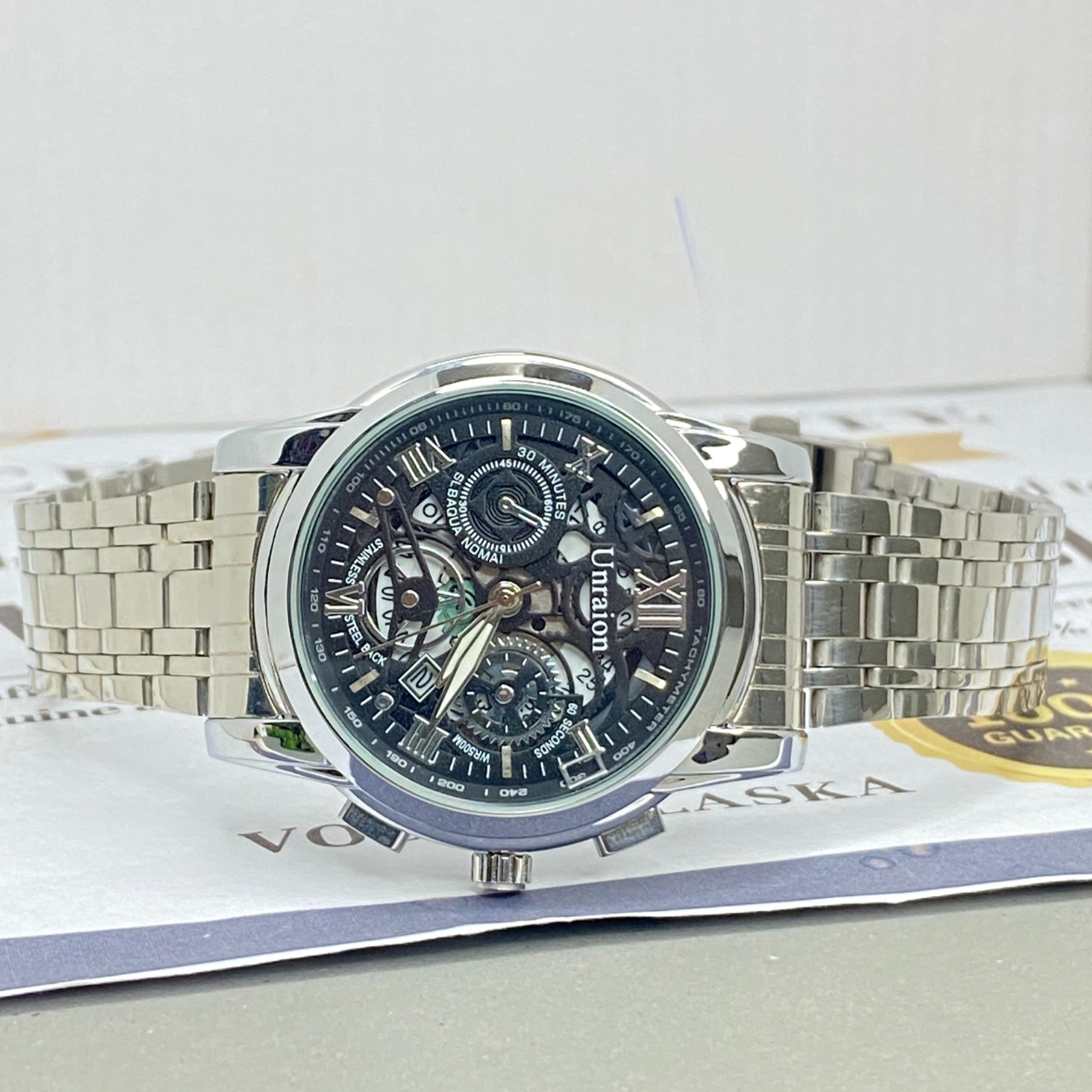 UNRAION Analog Time Skelton Dial Stainless Steel Chain Watch For Men With Date Display